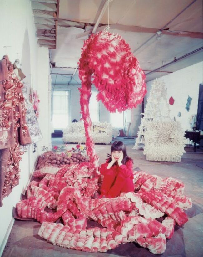 6Yayoi Kusama lying on the base of My Flower Bed (1962) in New York.jpg