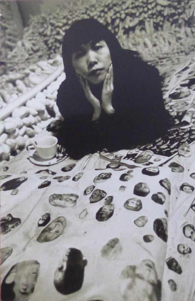 7Yayoi Kusama, with her work, Face Obsession, 1964.jpg
